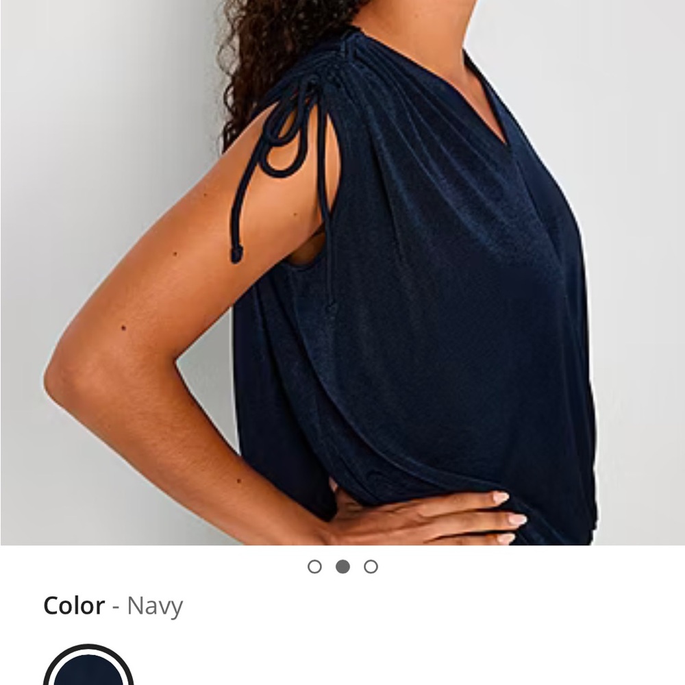 Beautiful navy blouse made by 52 seven great detail on shoulders,elastic waist